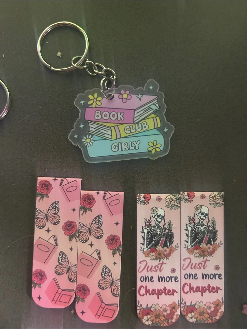 Book club keychain and bookmark tchotchkes